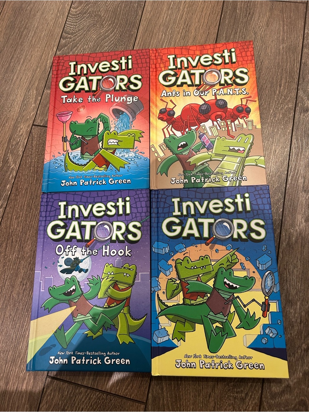 Scholastic InvestiGators Four-Book Set ā Red, Orange, Purple, Blue Covers